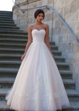 Wedding dress from the collection of Crystal Design 2015 with a skirt of roses