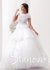 Magnificent wedding dress with a multi-layer skirt