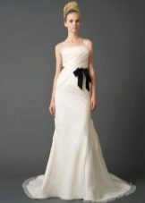 Wedding dress from Vera Wong from the collection 2011 with a black belt