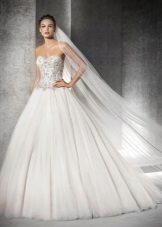 Magnificent wedding dress with rhinestones on the corset