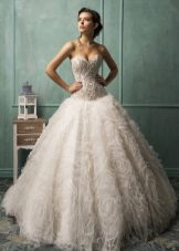 Magnificent wedding dress with the decorated corset