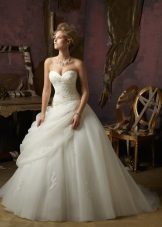 The lush wedding dress by Mori Lee is multi-layered