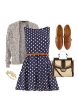 Dark blue dress with white polka dots and accessories