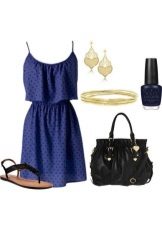 Dark blue dress with small black polka dots and matching accessories