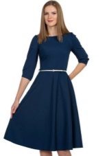 Blue monophonic dress of medium length with a semi-sun skirt