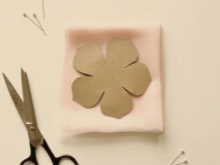 Cutting a flower from fabric