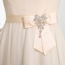 Bow and accessories for a wedding dress