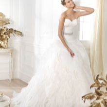 A wedding dress with a belt from the DREAMS collection by Pronovias