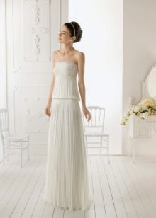 A simple wedding dress with a pleated skirt