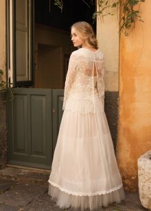 Wedding dress with a transparent cape