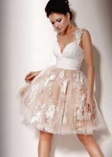 Short wedding dress with a fluffy skirt and floral pattern