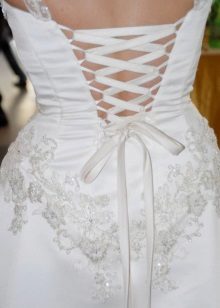 Wedding dress with open corset