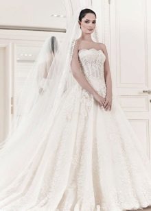 Wedding dress from the 2014 a-silhouette collection with a transparent corset