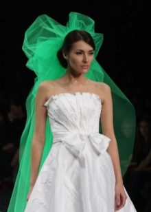 White wedding dress with green veil