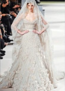 Wedding dress of lace with a veil by Elie Saab