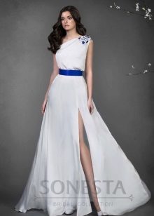 Wedding dress by Natalia Romanova with a blue belt