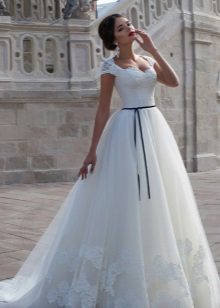 Wedding fluffy dress with a thin contrast belt