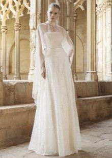 Wedding dress from Raimon Bundo with a cape