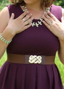 Eggplant dress with mint-colored accessories