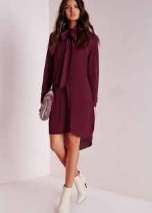 Eggplant dress in combination with light shoes