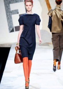 Orange tights to a blue dress