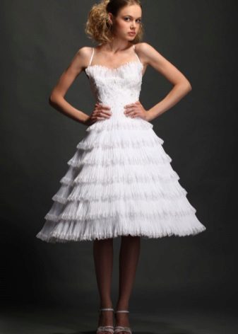 Wedding dress with a full skirt pleated