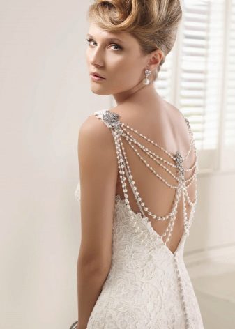 Wedding dress with open back and pearl thread