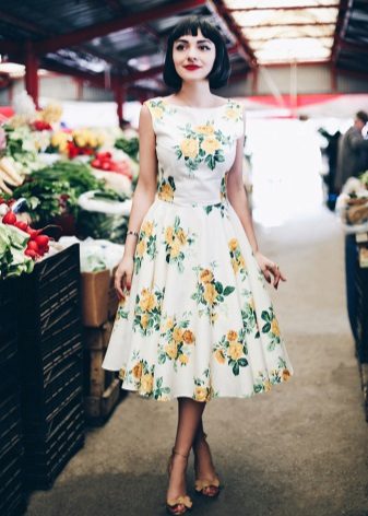 Floral print on a dress with a fluffy skirt in the style of the 60s