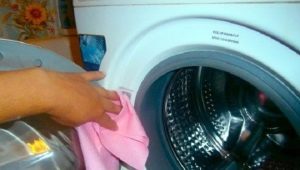 How to clean the washing machine from dirt and smell?