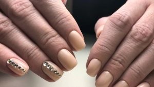 Beautiful manicure gel polish in nude shades