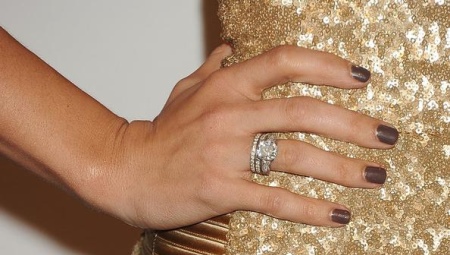 Which finger is the engagement ring?