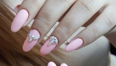 Pink manicure with rhinestones: glitter and femininity