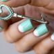 The combination of white and turquoise colors in manicure