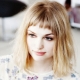 Short bangs: types, tips on selection and styling