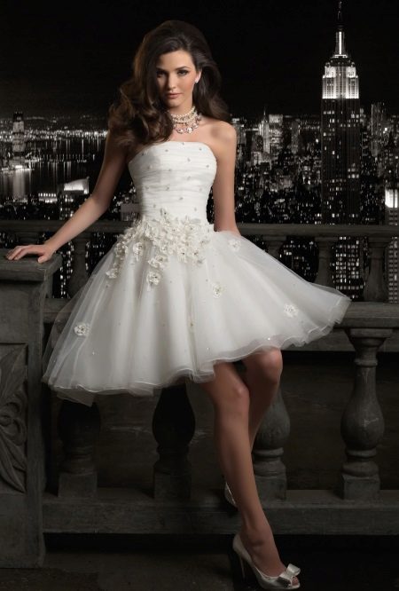 Short wedding dress with a fluffy skirt