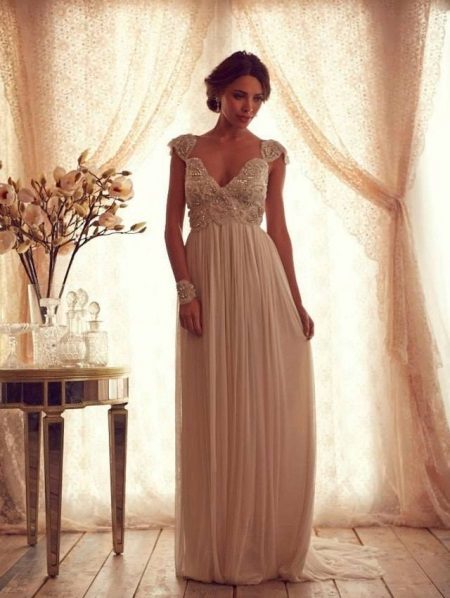 Wedding dress with a decadent bodice for a pear figure