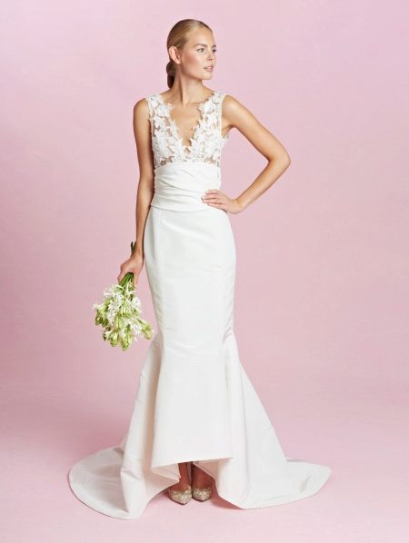 Wedding dress with wide straps and deep neckline