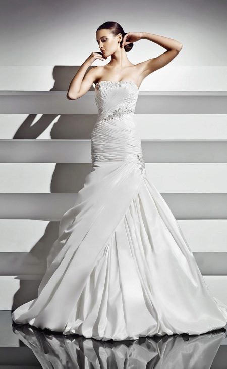 Wedding dress with drapery by Cupid Bridal