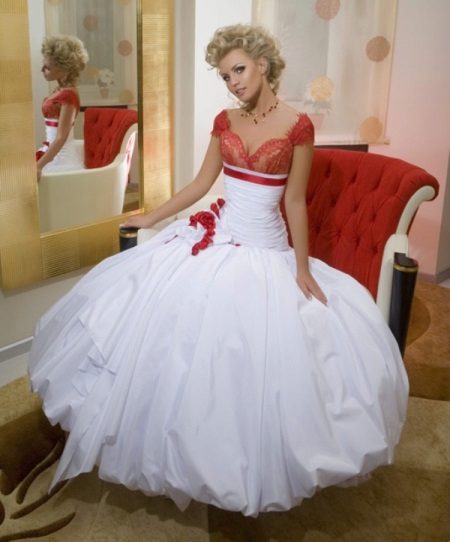 Wedding dress from the collection Femme Fatale with a red bodice