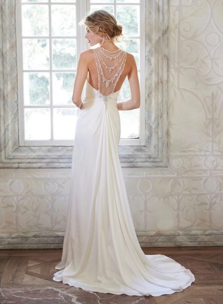 Wedding dress with a train and an open back straight