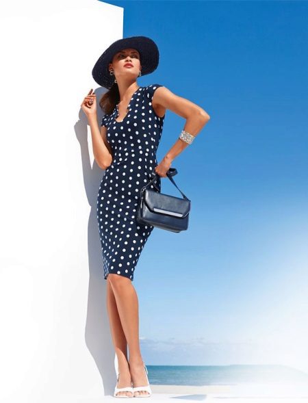 Polka dot dress and beautiful woman in a hat